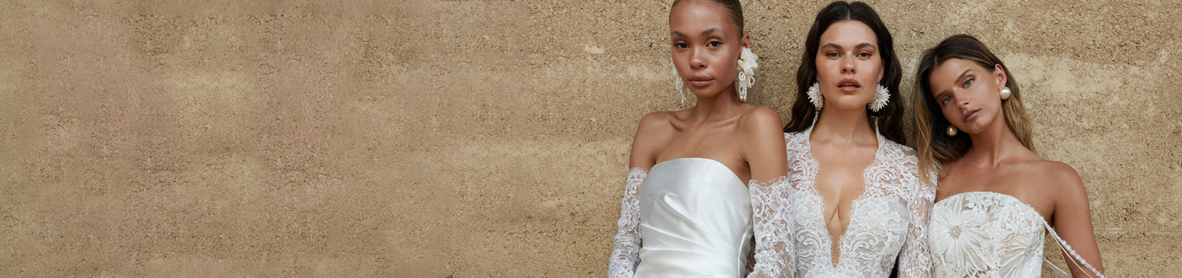 Models wearing satin and lace wedding dresses