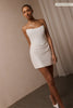 A woman wears a structured corset-style bodice and a short wedding skirt_XS_
