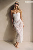 A woman wears a structured corset-style bodice and a lace wedding skirt_XS_