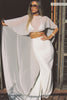 A woman models a sheer cape and a long wedding skirt_XS_