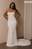 A woman models a structured corset and a long wedding skirt_L_
