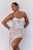 Woman wearing a strapless lace wedding dress_L_
