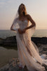 Woman in a lace wedding dress by the ocean_XS_