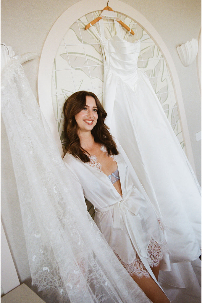 Woman in a satin bridal robe