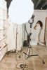 Photography studio setup with a model in a wedding dress