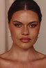 Women wearing pearl earrings
