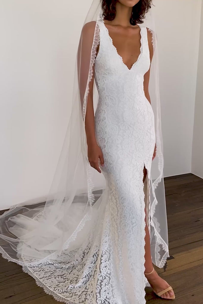 A V-neck lace wedding dress.